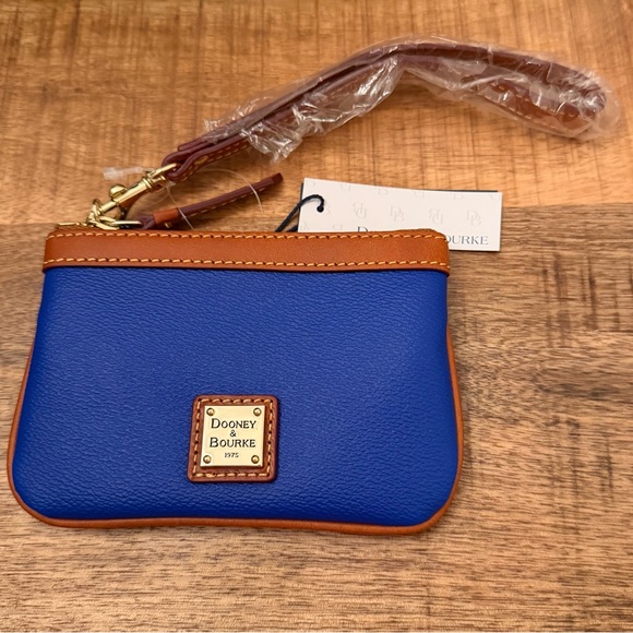 Dooney & Bourke Handbags - Dooney & Bourke Blue and Brown Pebble Grain Wristlet NWT